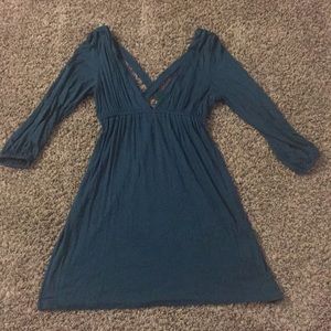 Sexy, low-cut, teal mini-dress